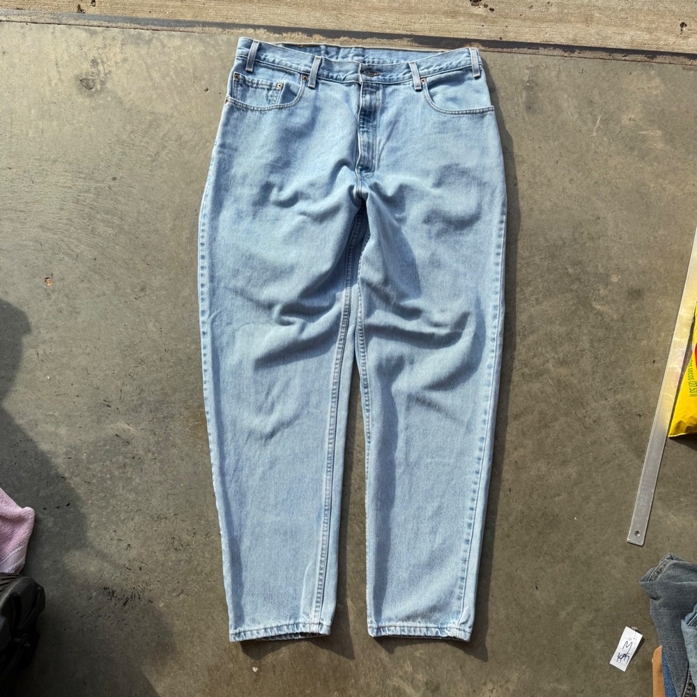 Vintage Levis 560 Loose‎ Fit Tapered Leg Jeans Light Wash Made in USA Mens 37x31